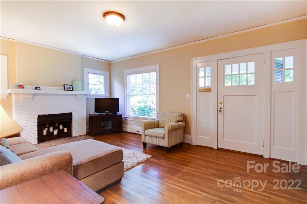 2123 Park Road Charlotte, NC 28203 - Photo 3 of 13 a living room with furniture and a fireplace