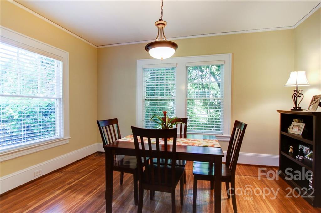 2123 Park Road Charlotte, NC 28203 - Photo 4 of 13 a view of a dining room with furniture window and wooden floor