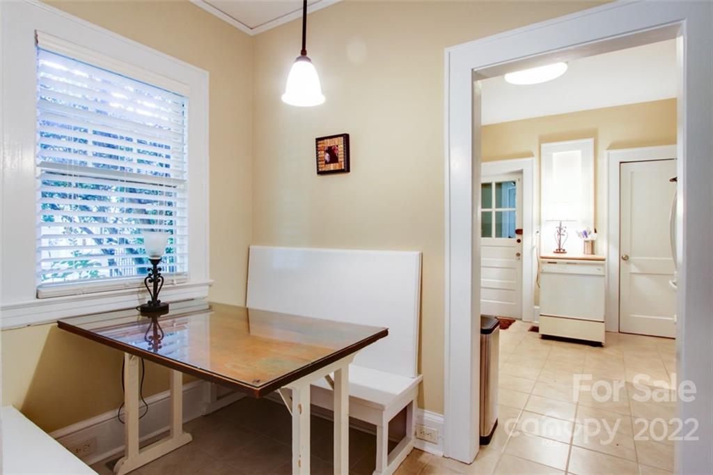 2123 Park Road Charlotte, NC 28203 - Photo 5 of 13 a view of a dining room with furniture and window