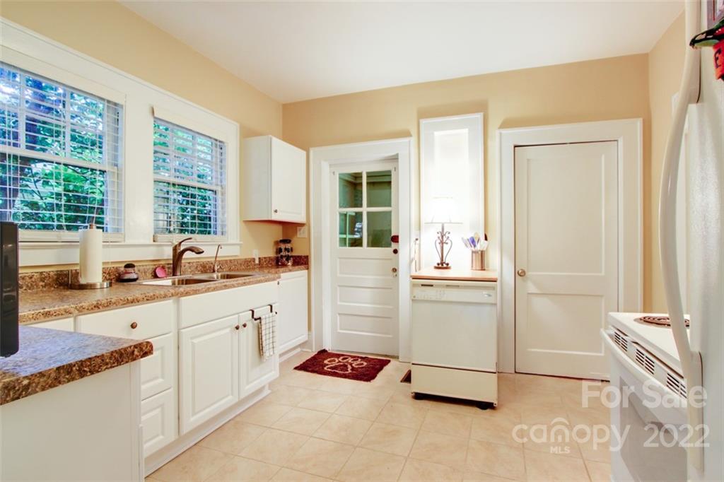 2123 Park Road Charlotte, NC 28203 - Photo 6 of 13 a kitchen with a refrigerator and a sink
