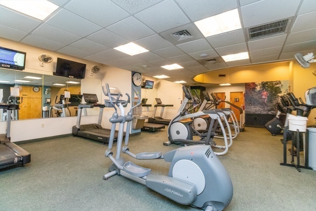33 Pond Avenue, Unit 1106 Brookline, MA 02445 - Photo 26 of 32 a view of a room with gym equipment