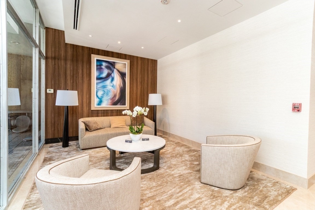 33 Pond Avenue, Unit 1106 Brookline, MA 02445 - Photo 5 of 32 a living room with furniture and window