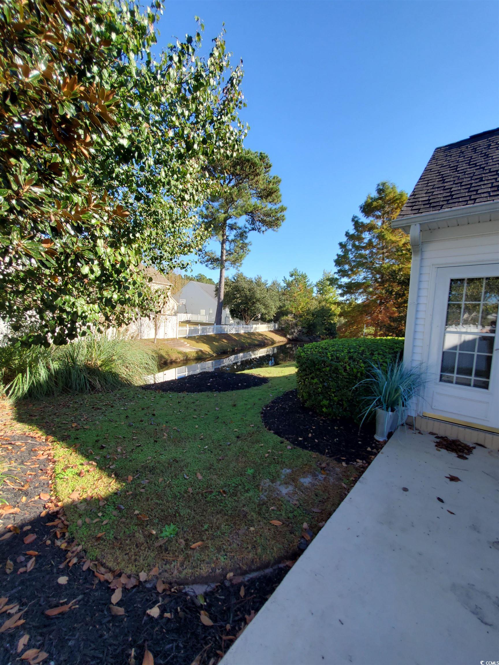 219 Spring Lake Drive Myrtle Beach, SC 29579 - Photo 6 of 20 View of grassy yard