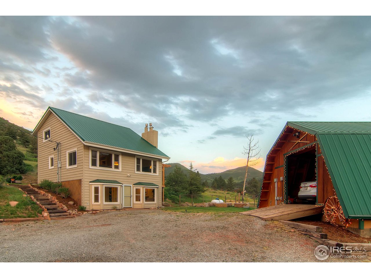 427 Red Gulch Road Lyons, CO 80540 - Photo 1 of 25 a view of a yard in front of house