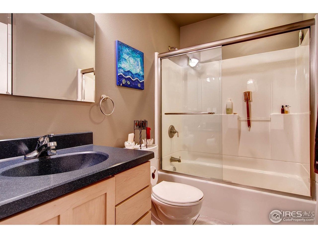 427 Red Gulch Road Lyons, CO 80540 - Photo 16 of 25 a bathroom with a sink and a mirror