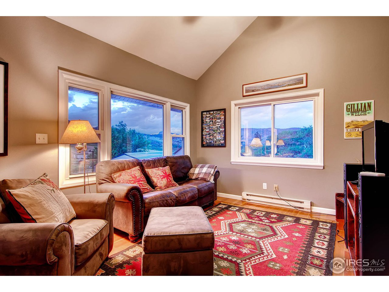 427 Red Gulch Road Lyons, CO 80540 - Photo 6 of 25 a living room with furniture and a large window