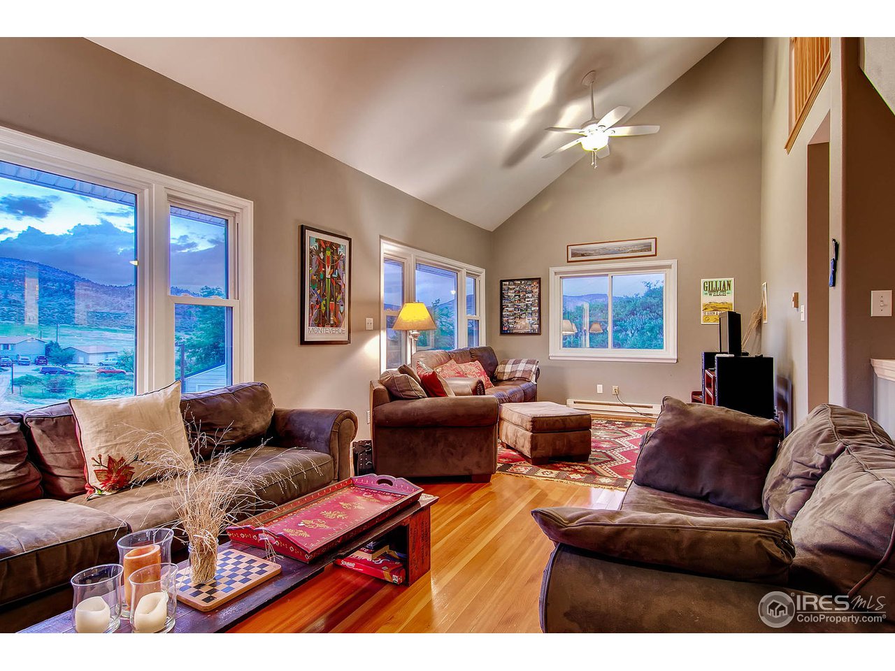 427 Red Gulch Road Lyons, CO 80540 - Photo 7 of 25 a living room with furniture and a large mirror