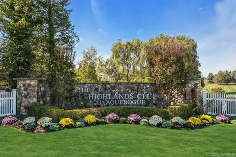 a view of a play house with a big yard