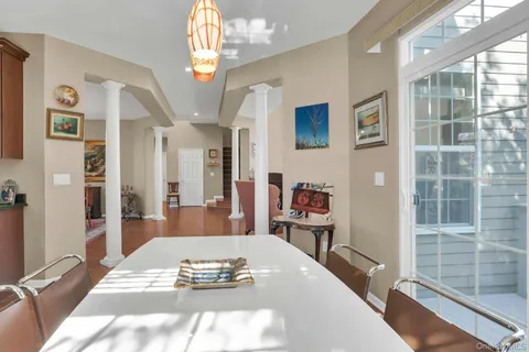 a view of a living room and dining room