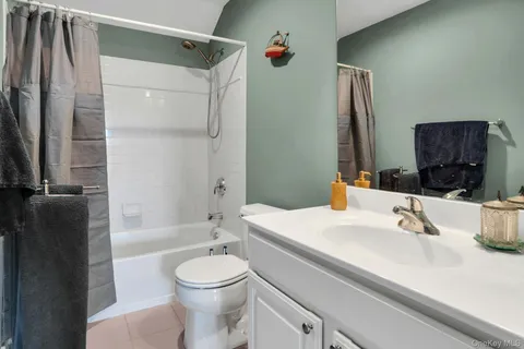 a bed room with a bed and a window