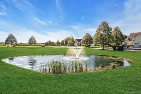 a view of a lake with a big yard