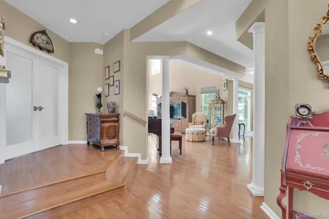 a living room with furniture and a table