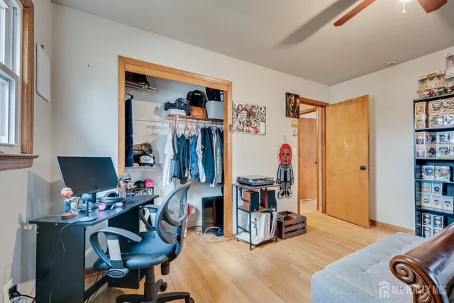 a view of a workspace with furniture and toys