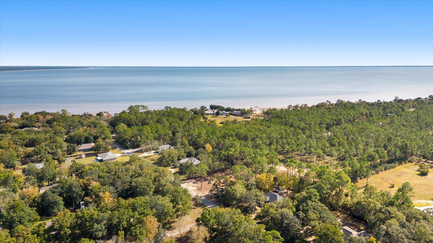 6455 Hammock Trace Milton, FL 32583 - Photo 16 of 20 a view of a city with mountains in the background