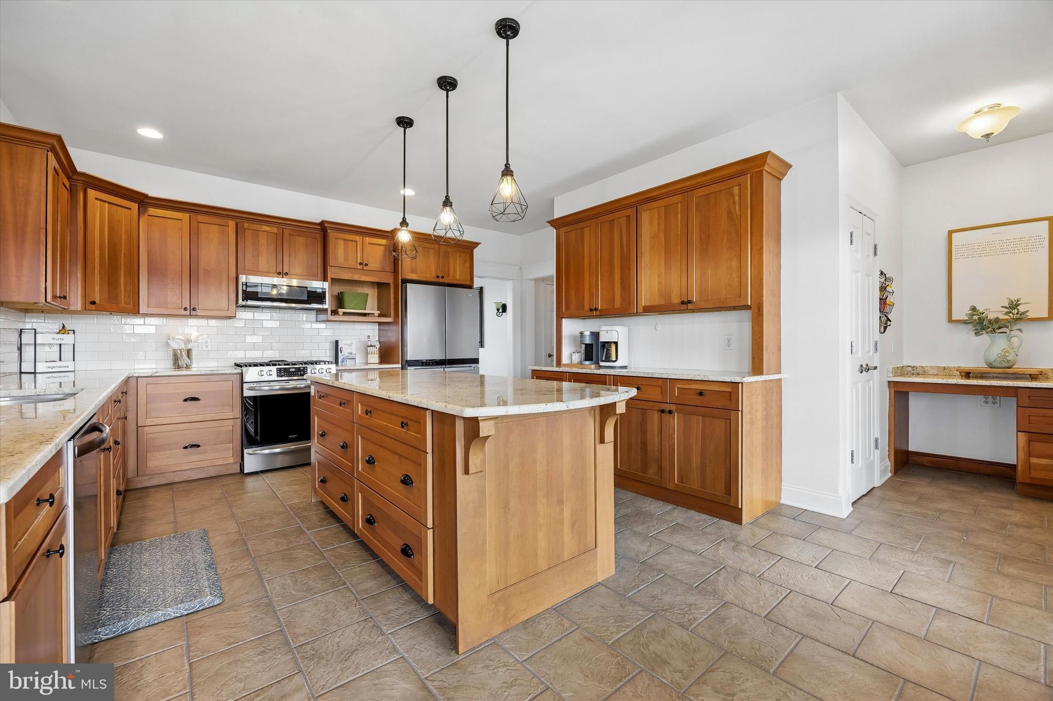 706 Kings Highway Mannington, NJ 08079 - Photo 15 of 35 a kitchen with stainless steel appliances sink stove and cabinets