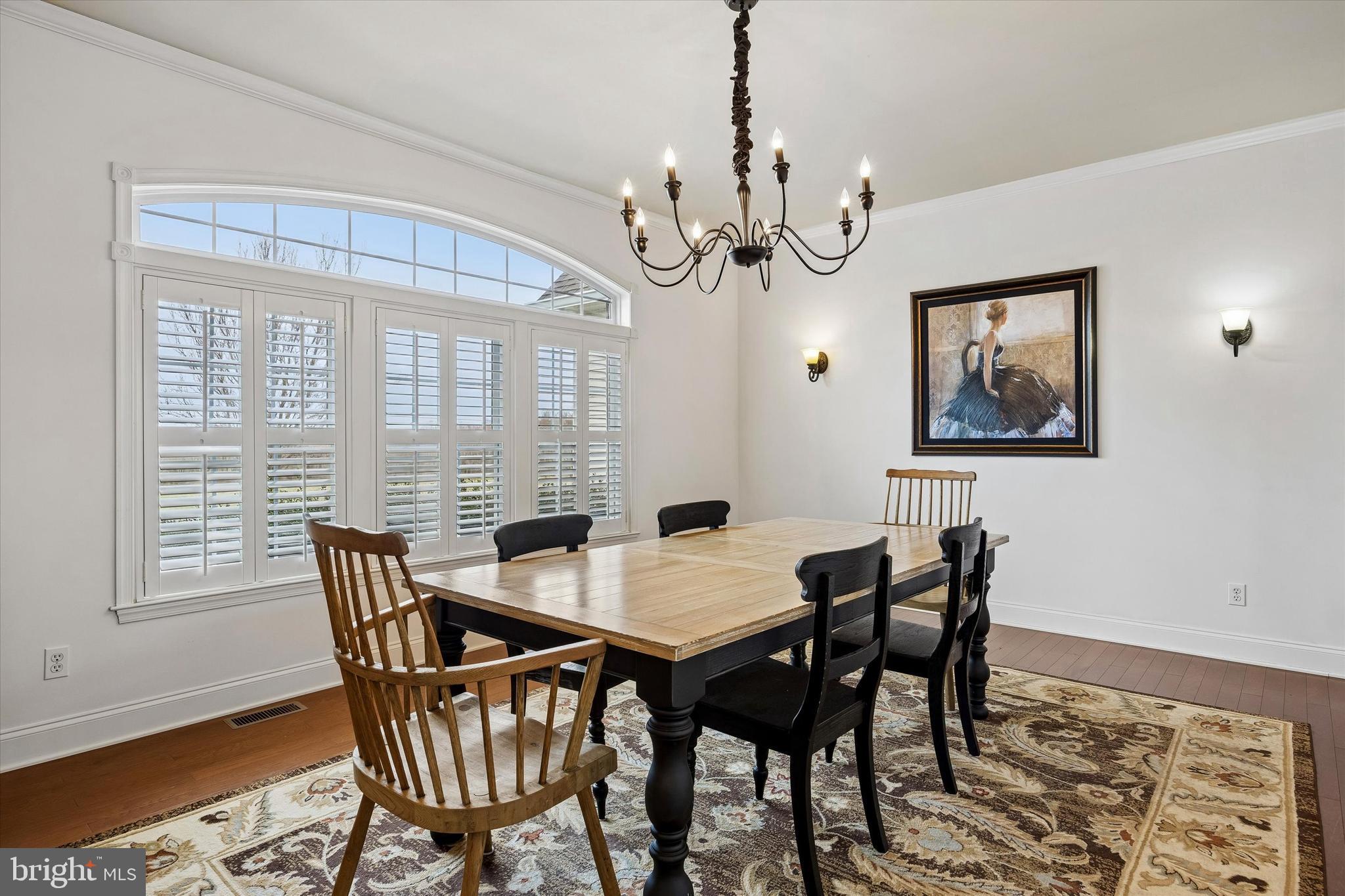 706 Kings Highway Mannington, NJ 08079 - Photo 21 of 35 a view of a dining room with furniture window and wooden floor