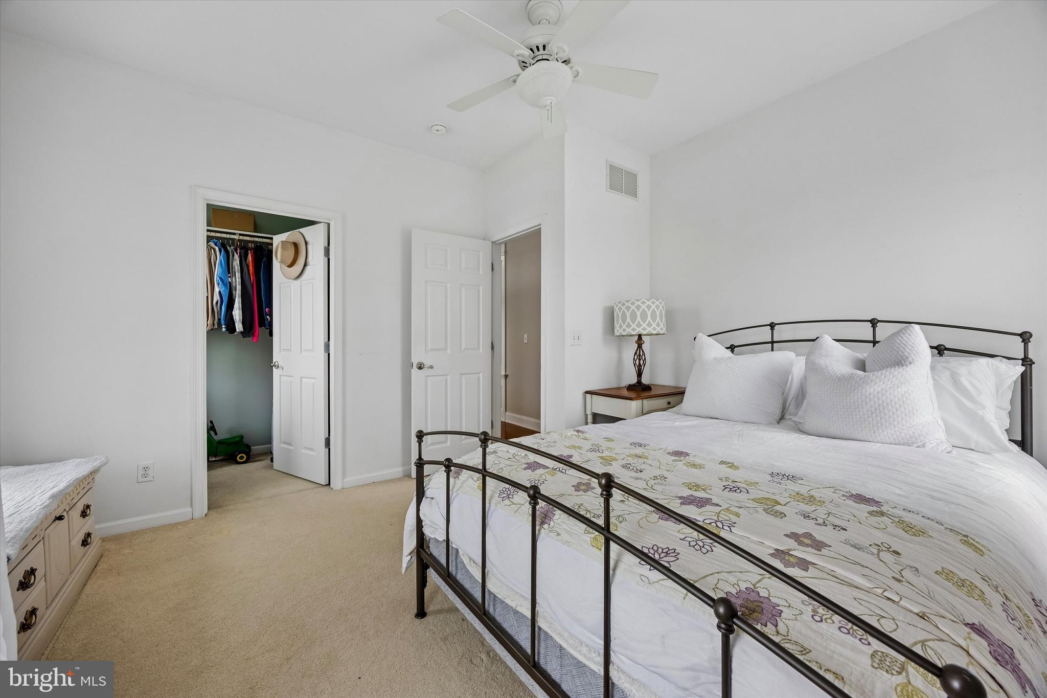 706 Kings Highway Mannington, NJ 08079 - Photo 25 of 35 a bedroom with a bed and a walk in closet