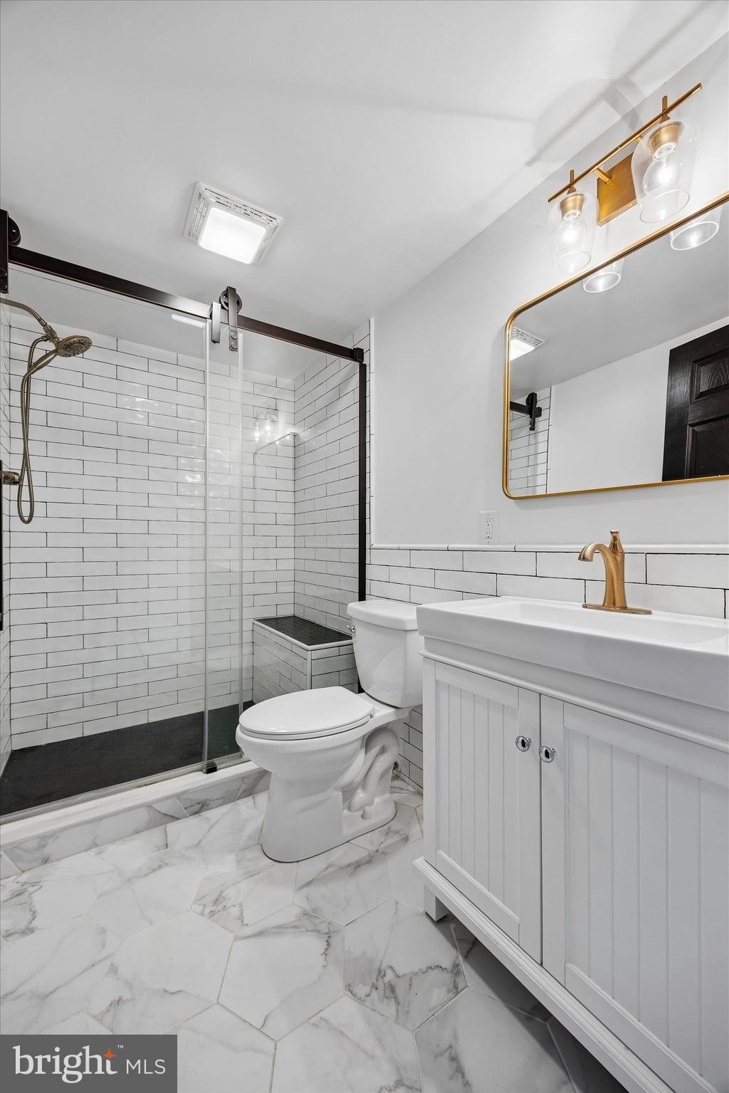 706 Kings Highway Mannington, NJ 08079 - Photo 33 of 35 a bathroom with a sink toilet and shower