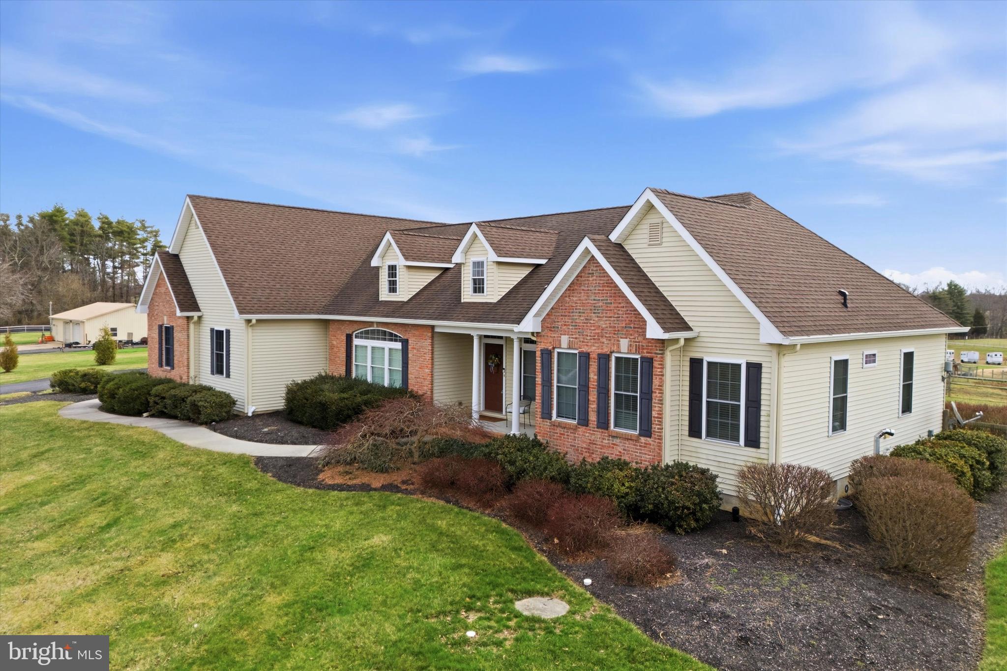 706 Kings Highway Mannington, NJ 08079 - Photo 4 of 35 a front view of a house with a yard