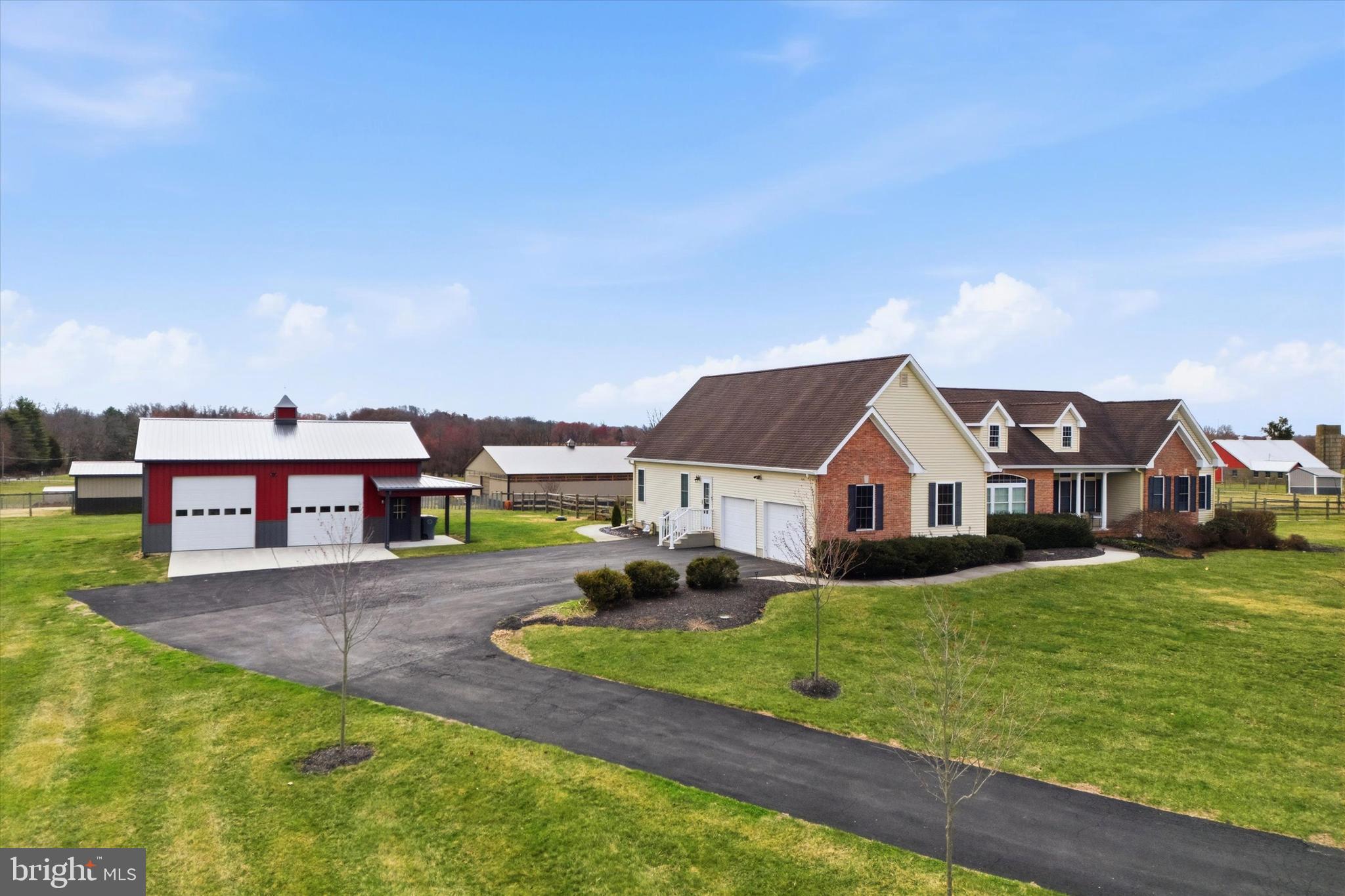 706 Kings Highway Mannington, NJ 08079 - Photo 5 of 35 a front view of a house with a yard