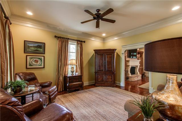 123 Page Road Nashville, TN 37205 - Photo 5 of 20 A quaint den accesses the large living room on the back side of the home.
