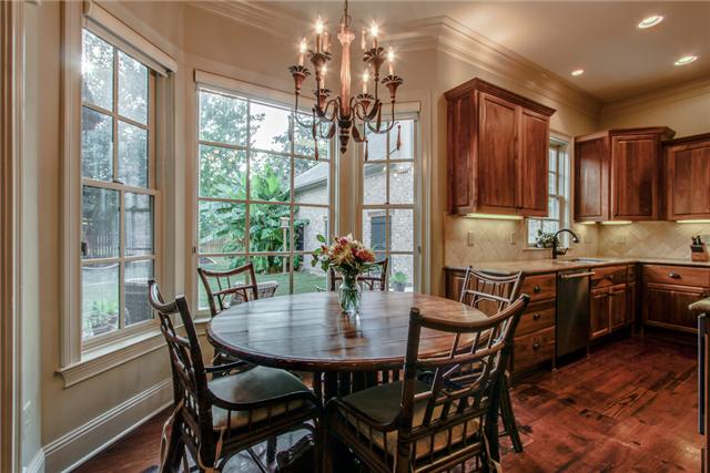 123 Page Road Nashville, TN 37205 - Photo 9 of 20 A cute breakfast nook has great views of the beautiful backyard.