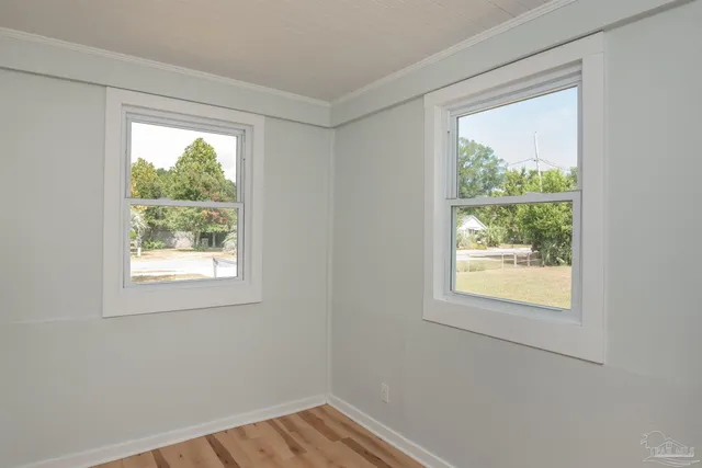 a view of an empty room and window