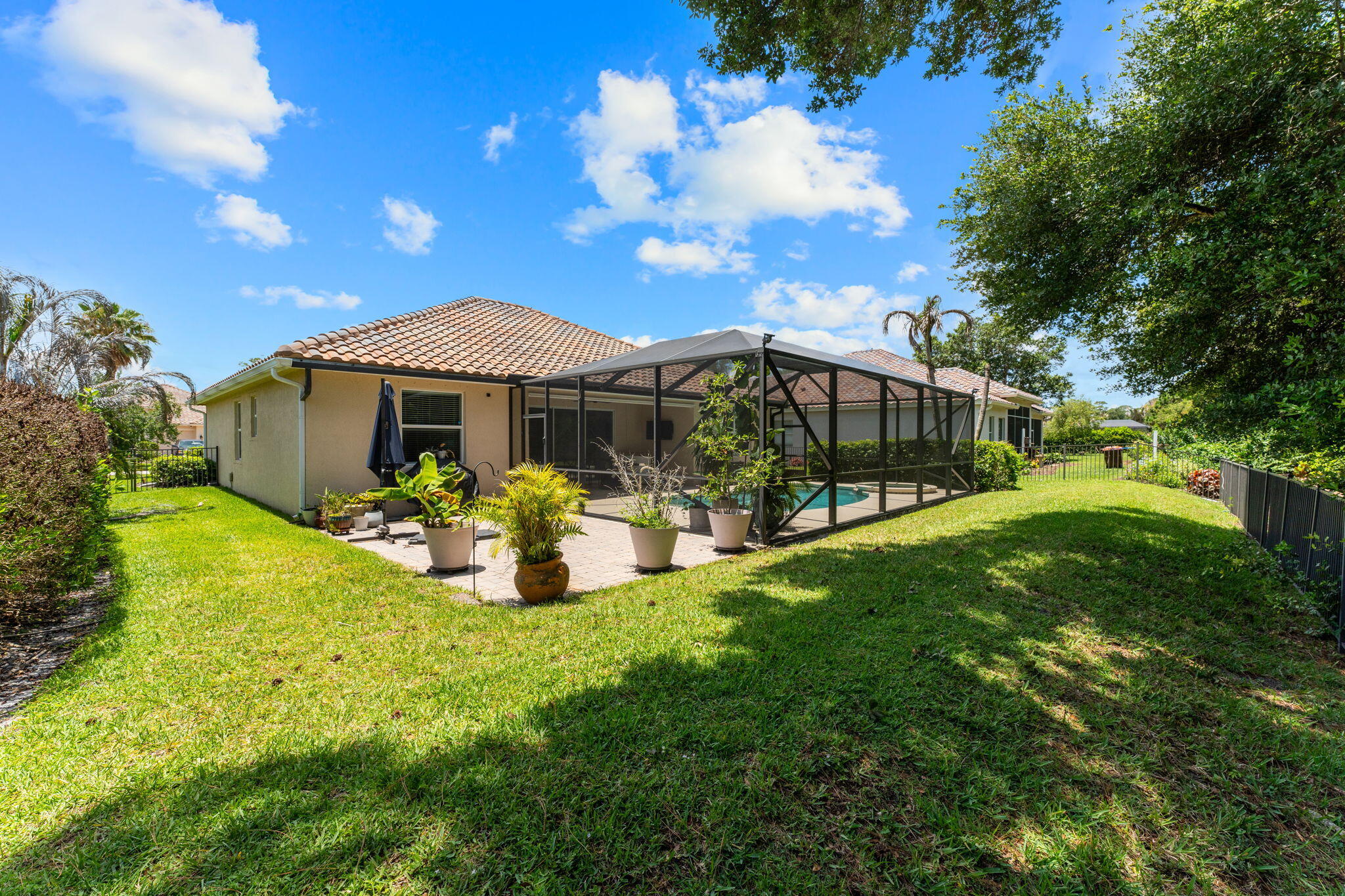 7657 Fieldstone Ranch Square Vero Beach, FL 32967 - Photo 41 of 52 a view of a house with backyard and sitting area