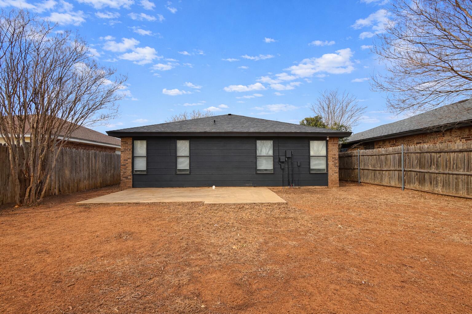 8407 Vernon Avenue Lubbock, TX 79423 - Photo 9 of 9 Modern home with patio in backyard