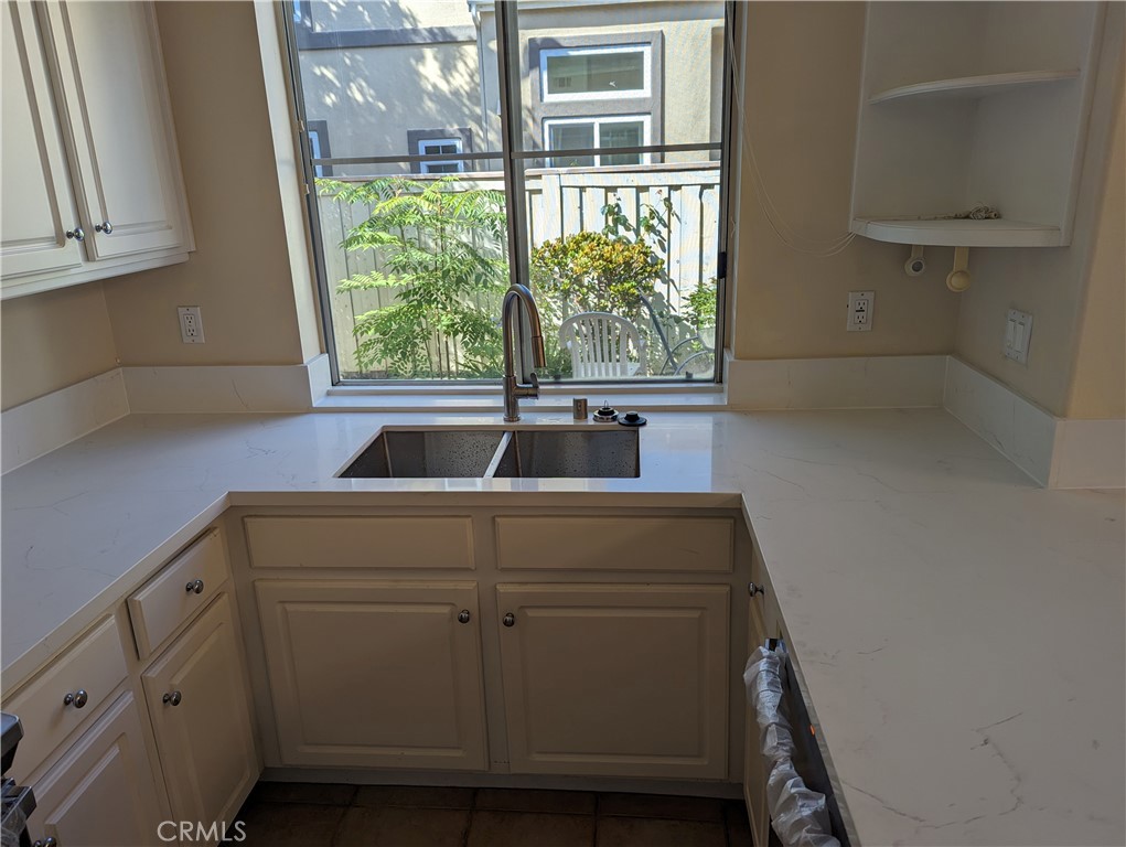 35 Del Cambrea Irvine, CA 92606 - Photo 19 of 21 a sink sitting in a bathroom next to a window