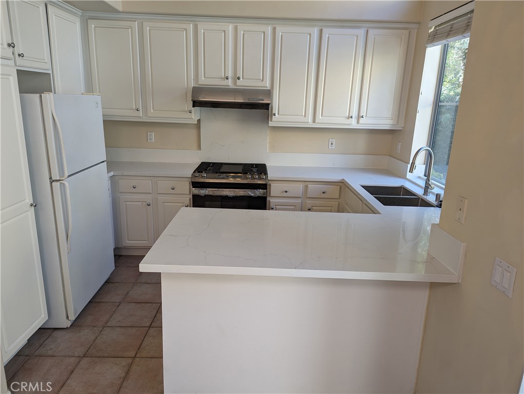35 Del Cambrea Irvine, CA 92606 - Photo 20 of 21 a utility room with dryer and washer