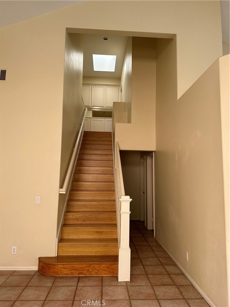 35 Del Cambrea Irvine, CA 92606 - Photo 7 of 21 a view of entryway and hall with wooden floor