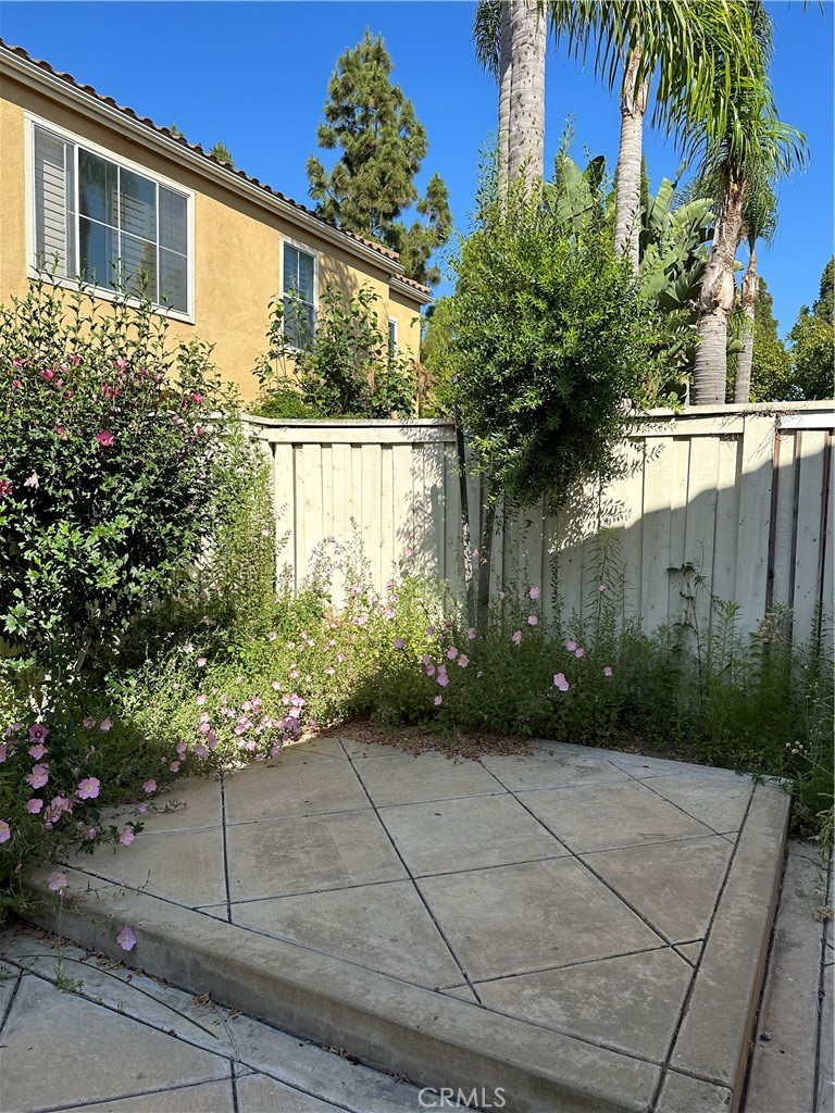 35 Del Cambrea Irvine, CA 92606 - Photo 10 of 21 a view of a house with a yard