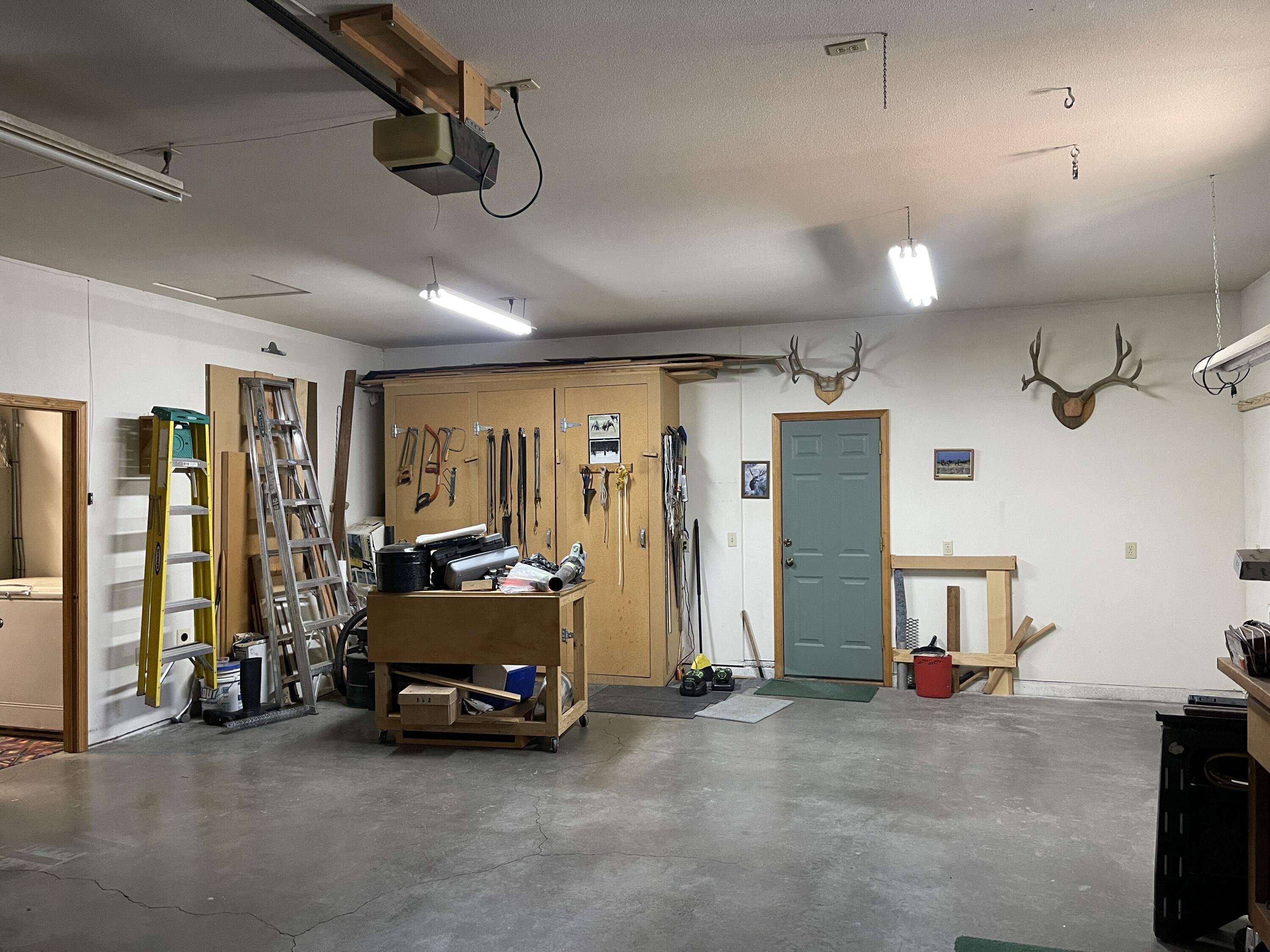 19761 Buck Canyon Road Bend, OR 97702 - Photo 20 of 33 Workshop space in 3 car garage