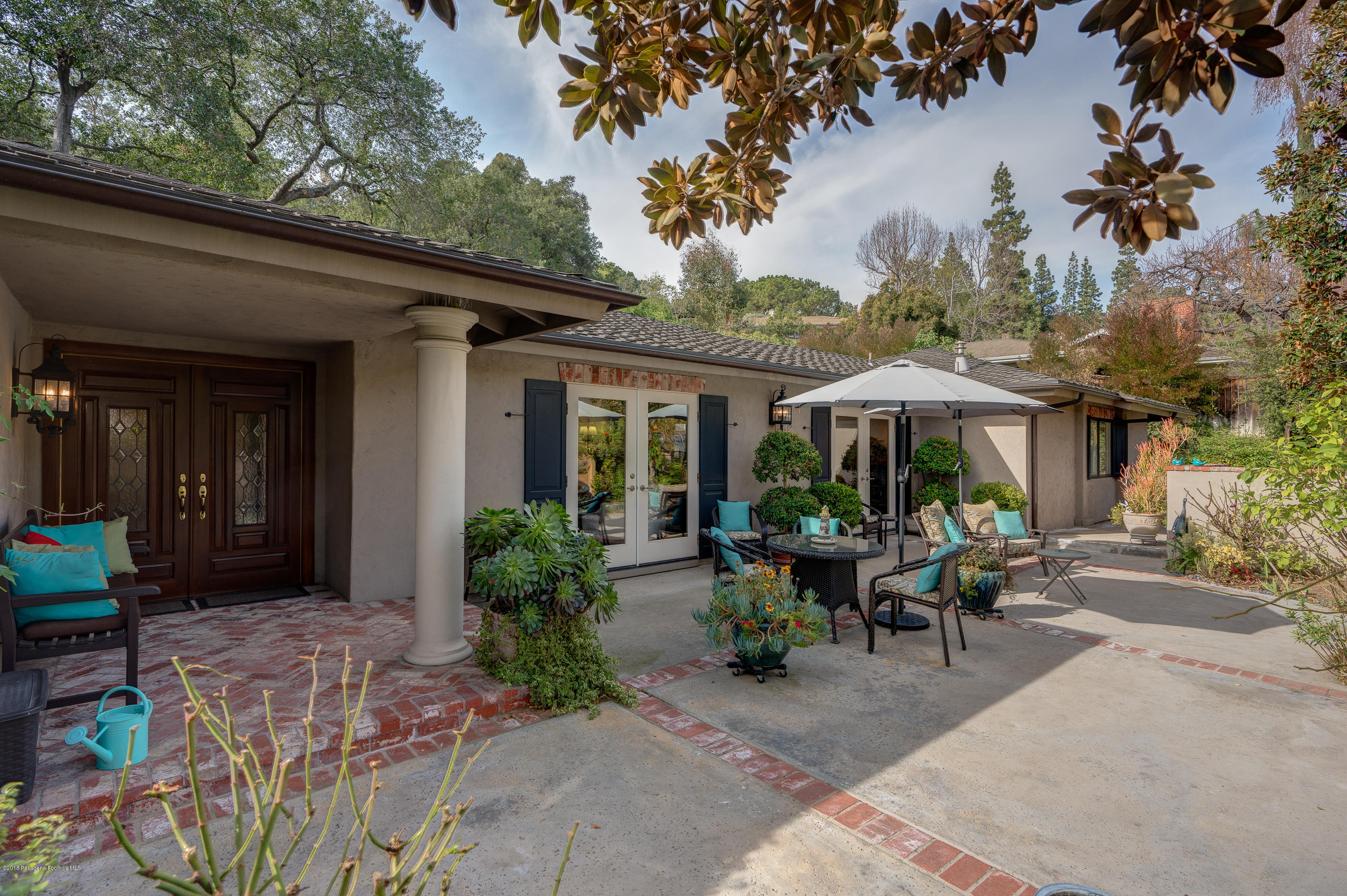 1550 Pegfair Estates Drive Pasadena, CA 91103 - Photo 4 of 16 a view of a house with sitting area and garden