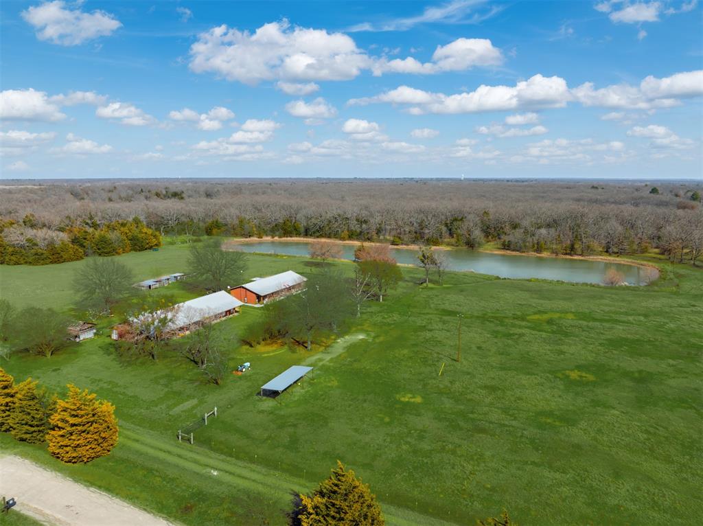 1900 County Road 33900 Powderly, TX 75473 - Photo 14 of 40 a view of a lake from a yard