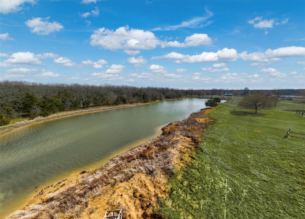 1900 County Road 33900 Powderly, TX 75473 - Photo 19 of 40 a view of a lake with a lake
