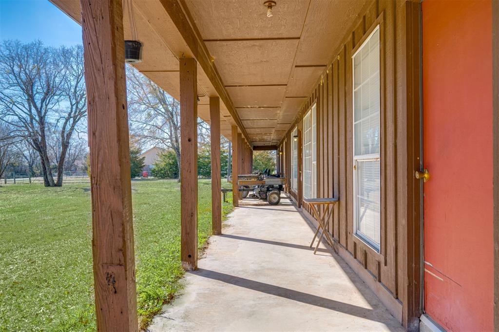 1900 County Road 33900 Powderly, TX 75473 - Photo 23 of 40 a view of a porch with garden