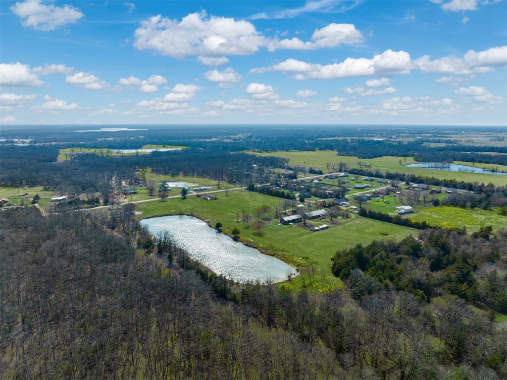 1900 County Road 33900 Powderly, TX 75473 - Photo 5 of 40 a view of a city with ocean view