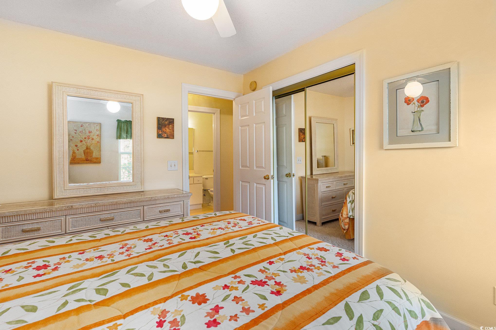 4280 Santolina Way, Unit C Murrells Inlet, SC 29576 - Photo 12 of 40 Bedroom with a closet and ceiling fan