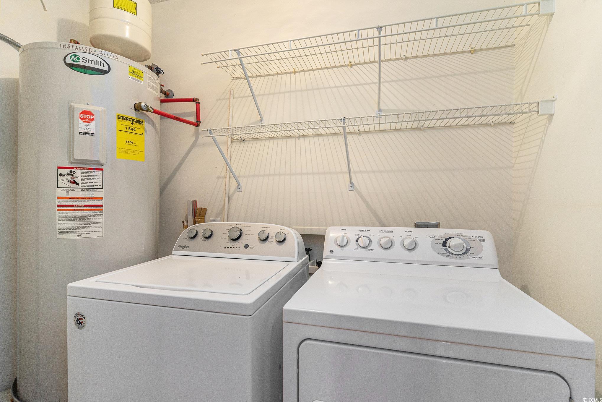 4280 Santolina Way, Unit C Murrells Inlet, SC 29576 - Photo 26 of 40 Laundry room with electric water heater and separate washer and dryer