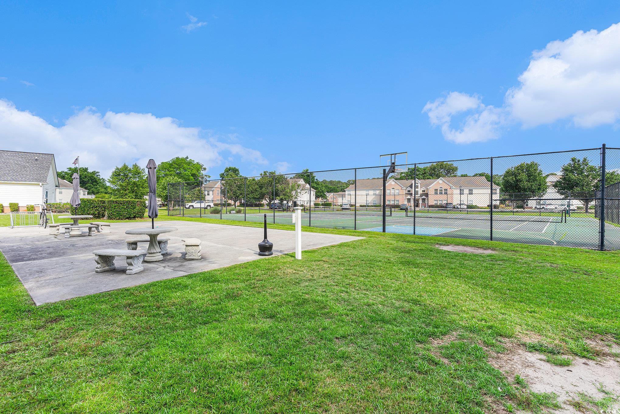 4280 Santolina Way, Unit C Murrells Inlet, SC 29576 - Photo 31 of 40 Surrounding community featuring a tennis court and a residential view
