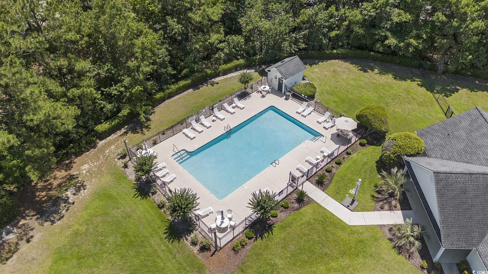 4280 Santolina Way, Unit C Murrells Inlet, SC 29576 - Photo 35 of 40 Bird's eye view of a pool area