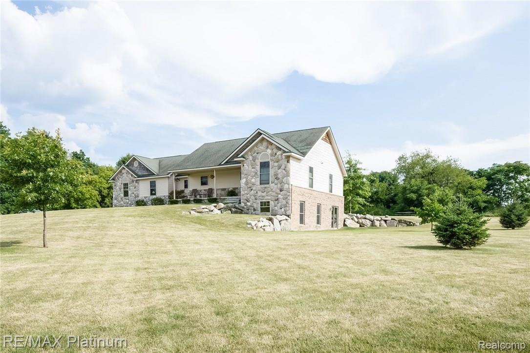 5655 West Coon Lake Road Howell, MI 48843 - Photo 2 of 36 002-Front_View-4613652-medium.jpg