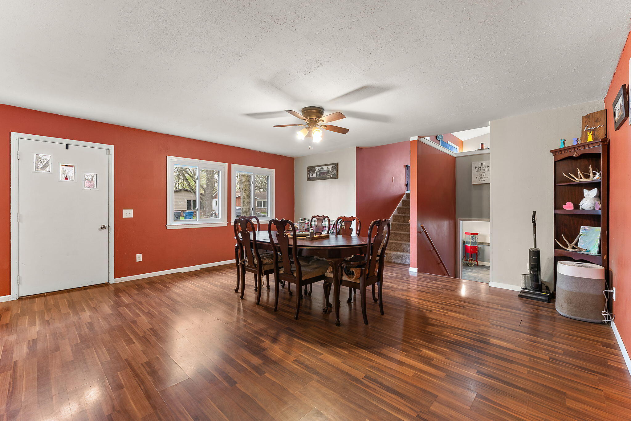 208 Stevenson Street Morocco, IN 47963 - Photo 12 of 31 a view of a dining room with furniture and wooden floor