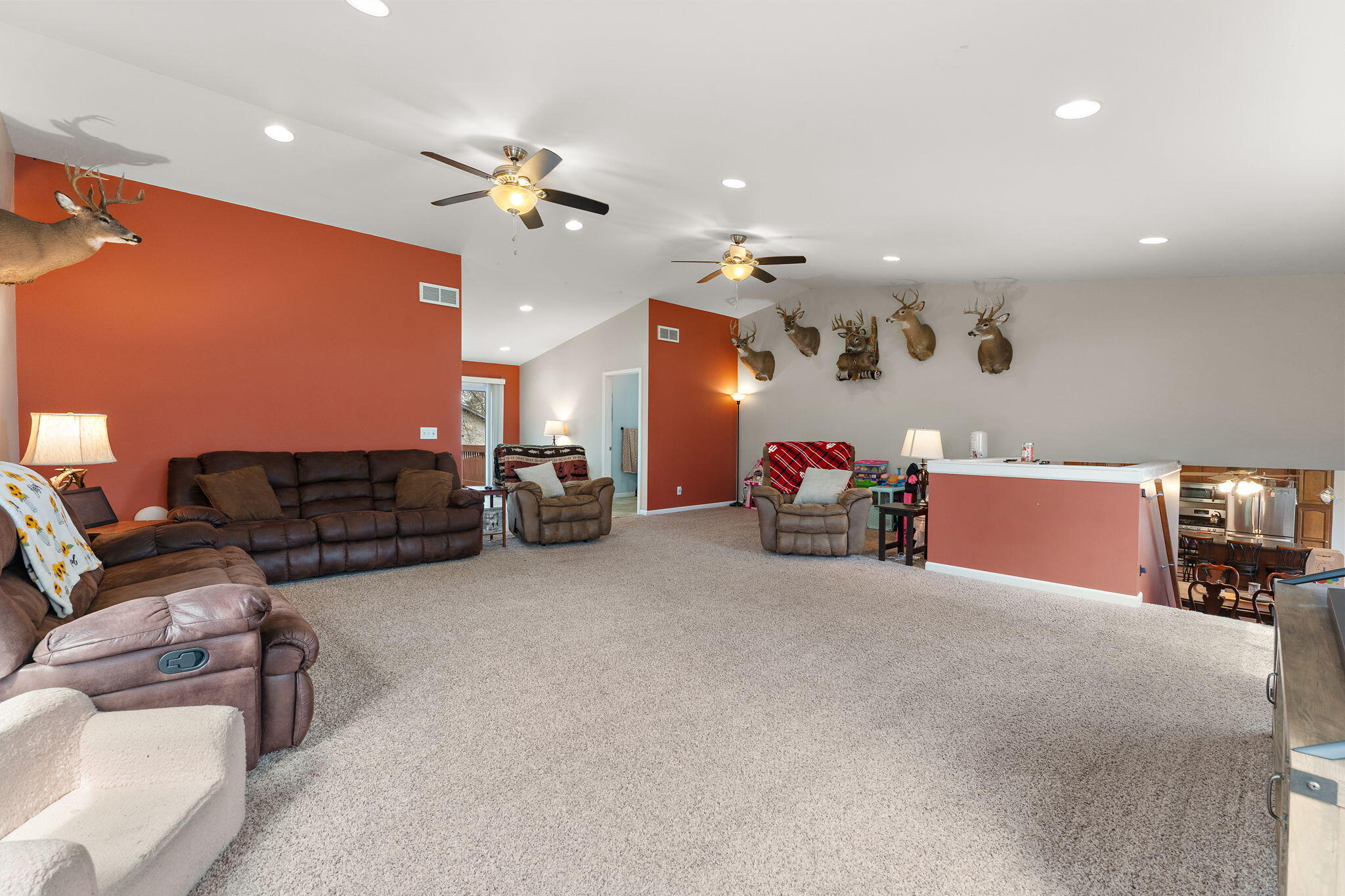 208 Stevenson Street Morocco, IN 47963 - Photo 19 of 31 a living room with furniture and a chandelier
