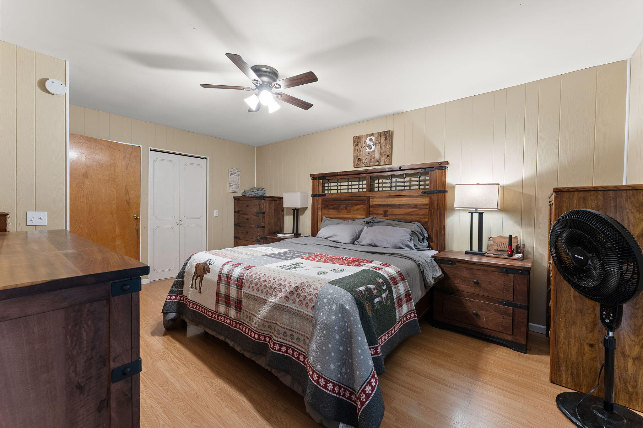 208 Stevenson Street Morocco, IN 47963 - Photo 26 of 31 a bedroom with a bed and a chandelier