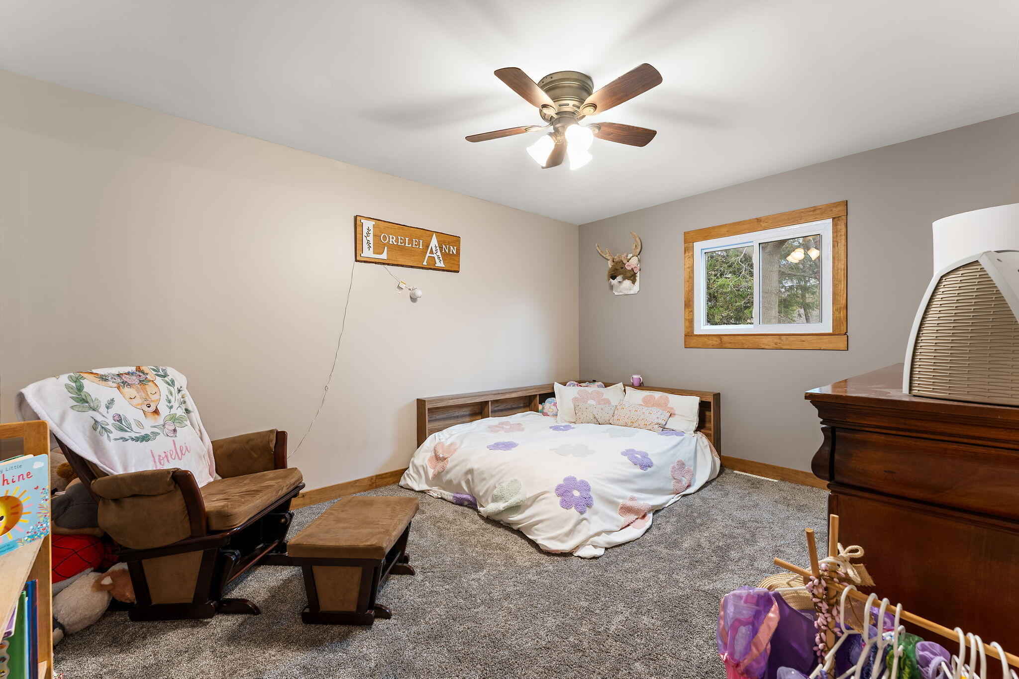 208 Stevenson Street Morocco, IN 47963 - Photo 27 of 31 a bedroom with a bed and wooden floor