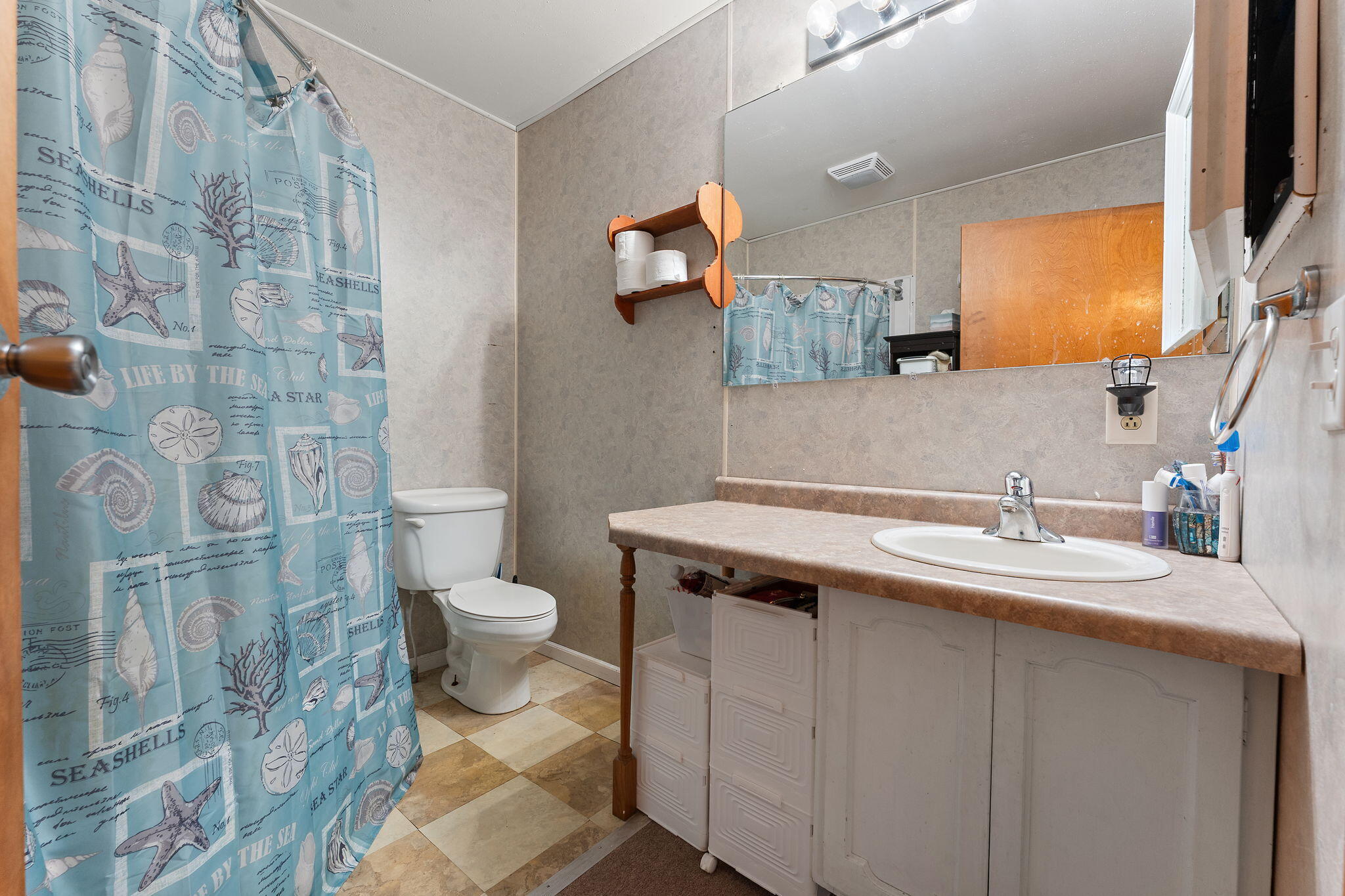 208 Stevenson Street Morocco, IN 47963 - Photo 29 of 31 a bathroom with a sink toilet and shower