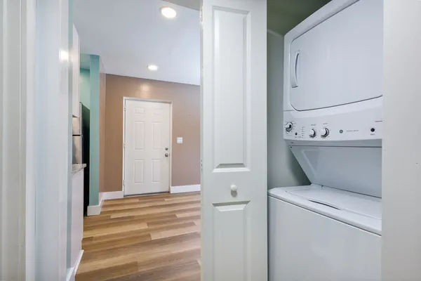 a view of bathroom with a washer and dryer